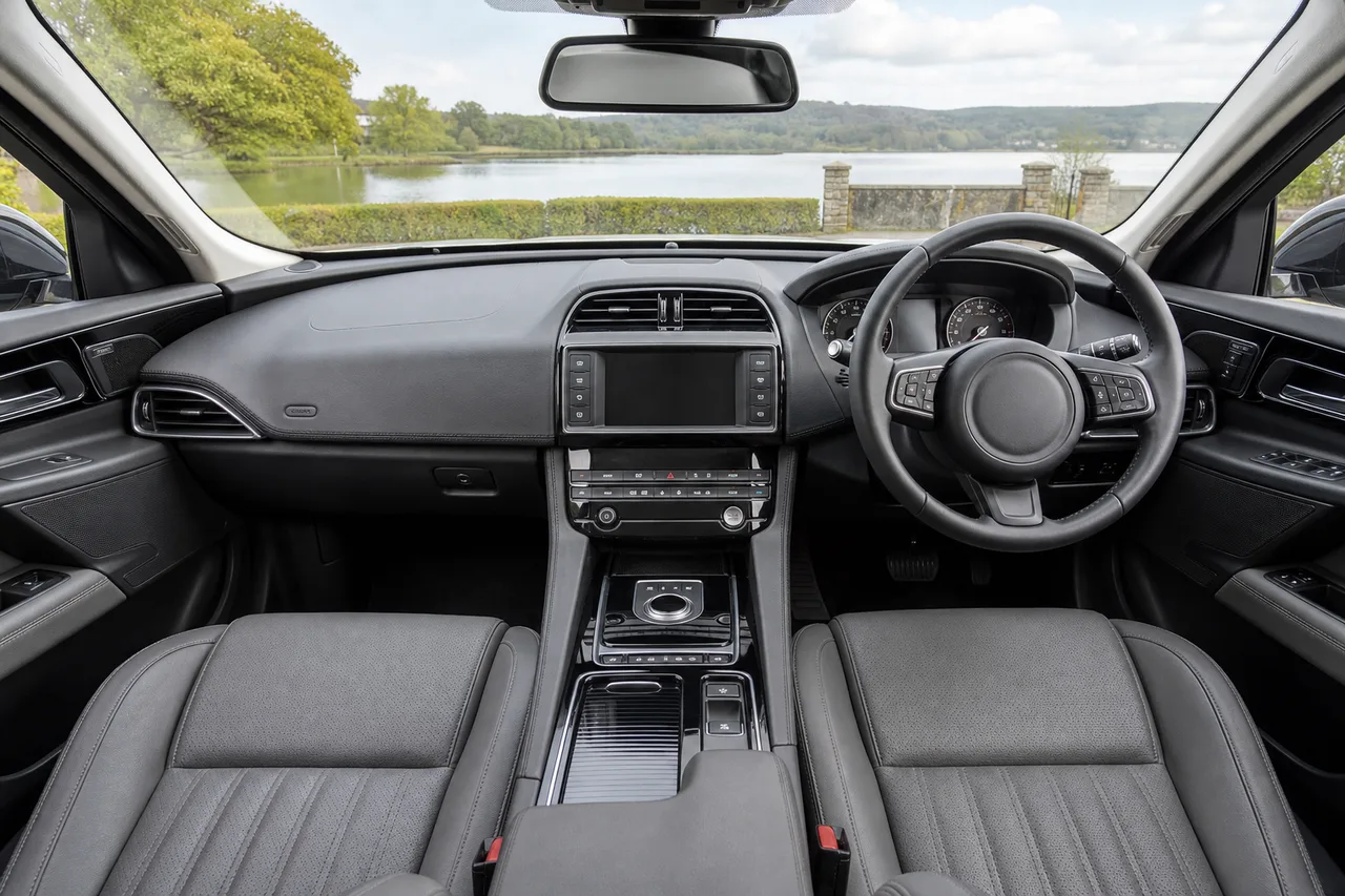 The same right-hand-drive car cabin as a clean, bright professional photo
